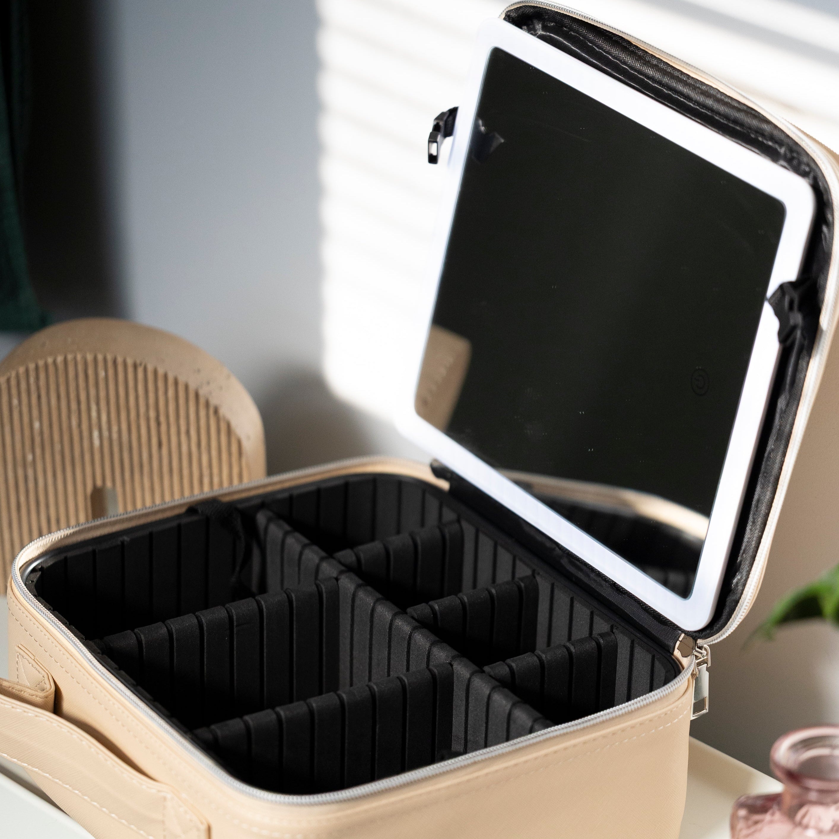 LED Makeup and Nailcare Cosmetic Case in the color Champagne, unzipped and open to see the inside compartments
