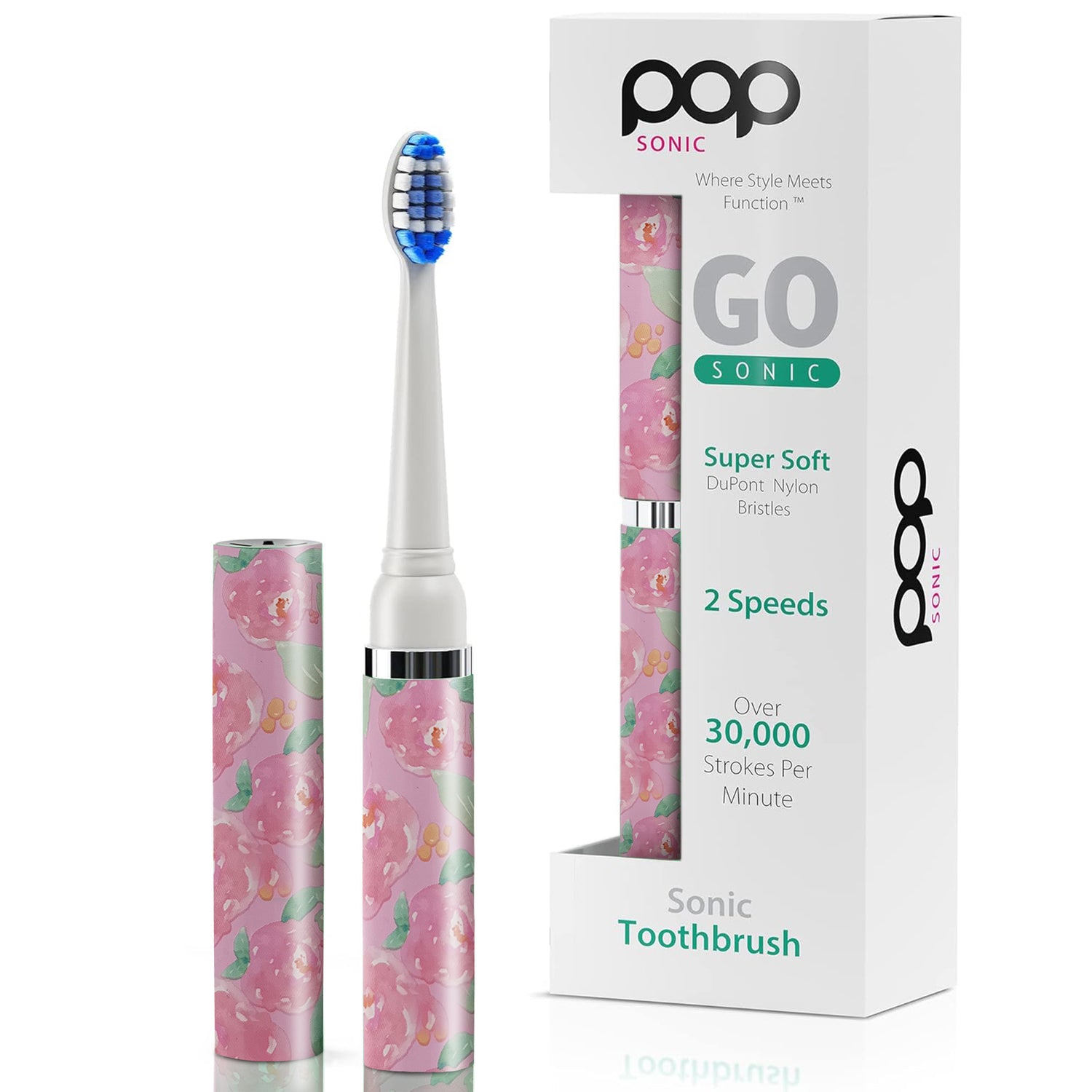 Sonic toothbrush with pink floral design and packaging on a white background