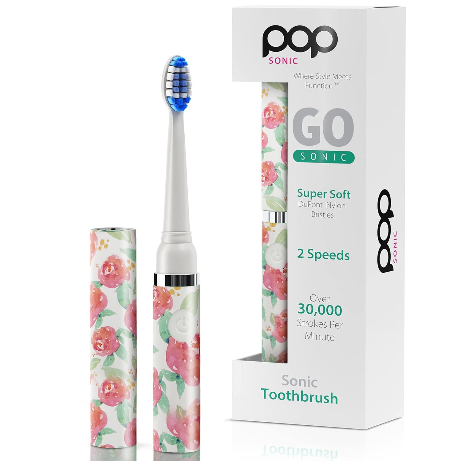 Sonic toothbrush with white floral design and packaging on a white