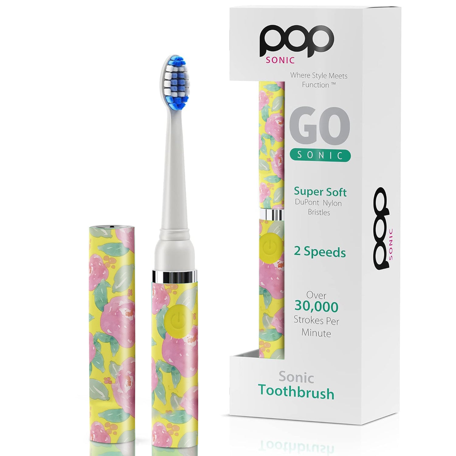Sonic toothbrush with yellow floral design and packaging on a white