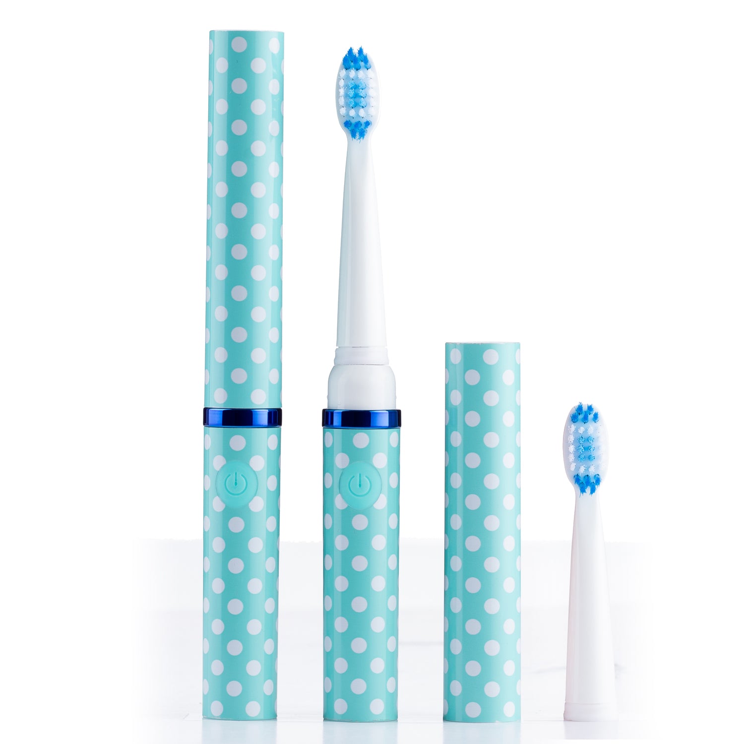 Electric toothbrush with polka dot design on a white background