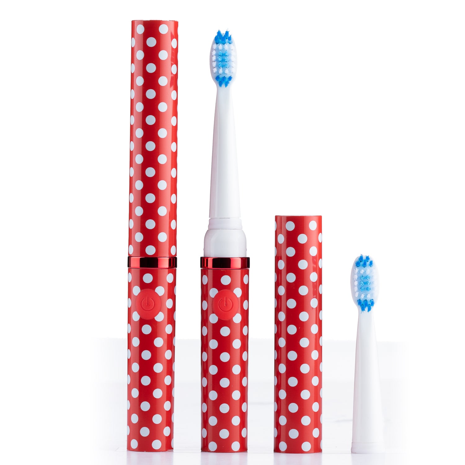 Electric toothbrush with red and white polka dot packaging on a white background