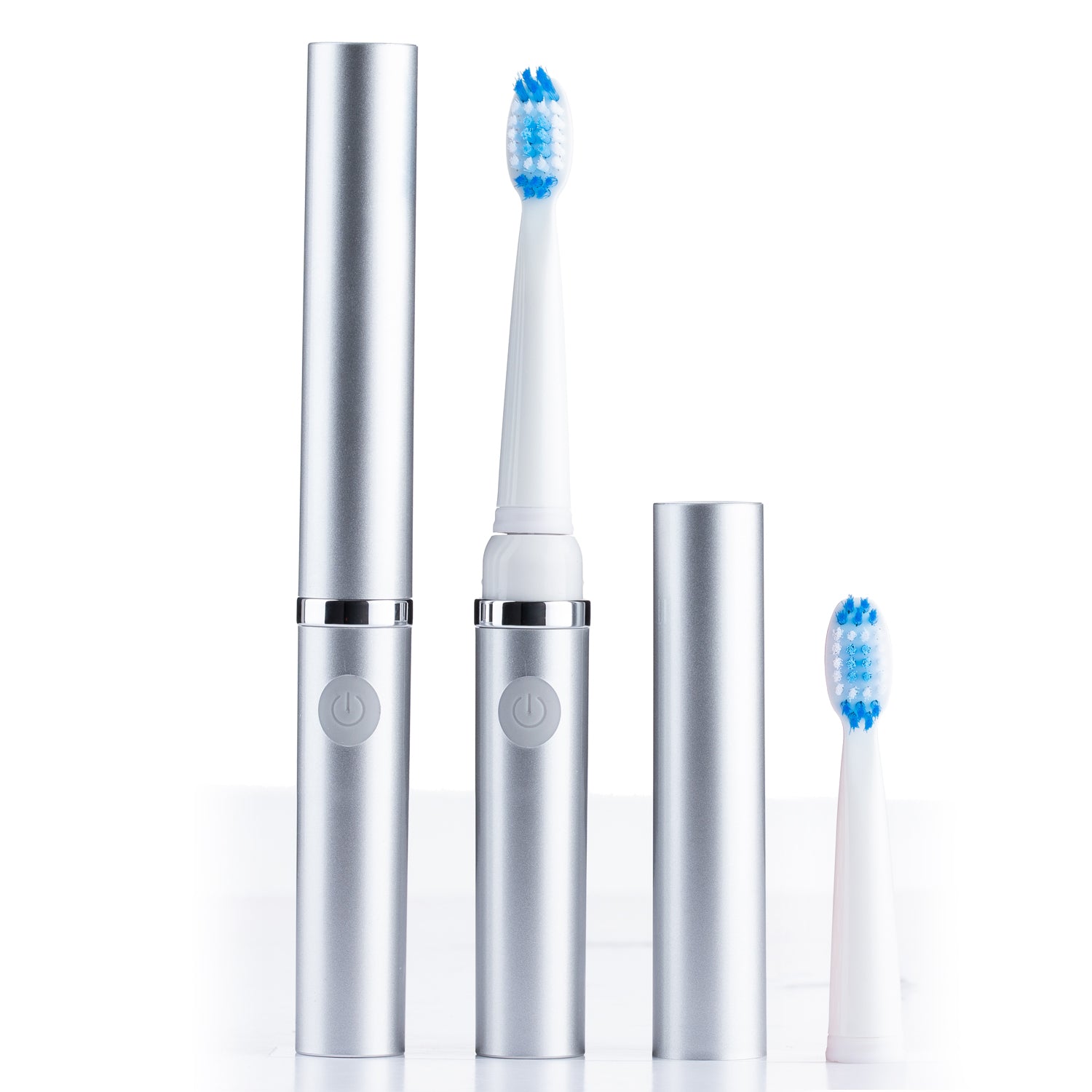 Set of silver electric toothbrushes with blue bristles on a white background