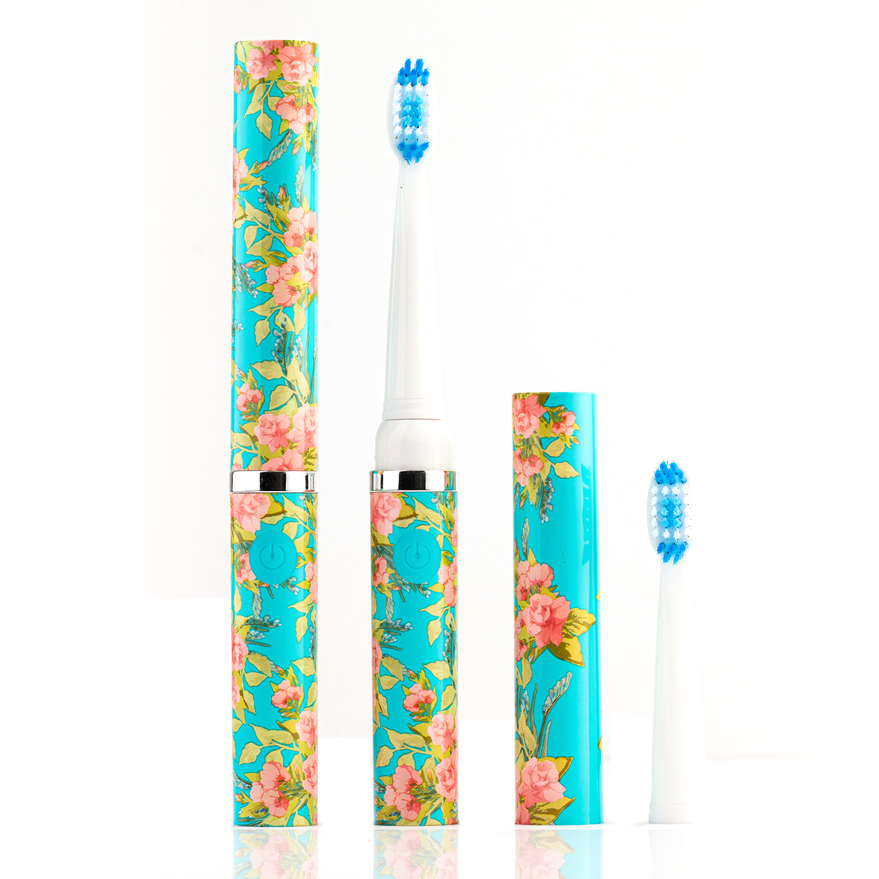 Floral-patterned electric toothbrush on a white background