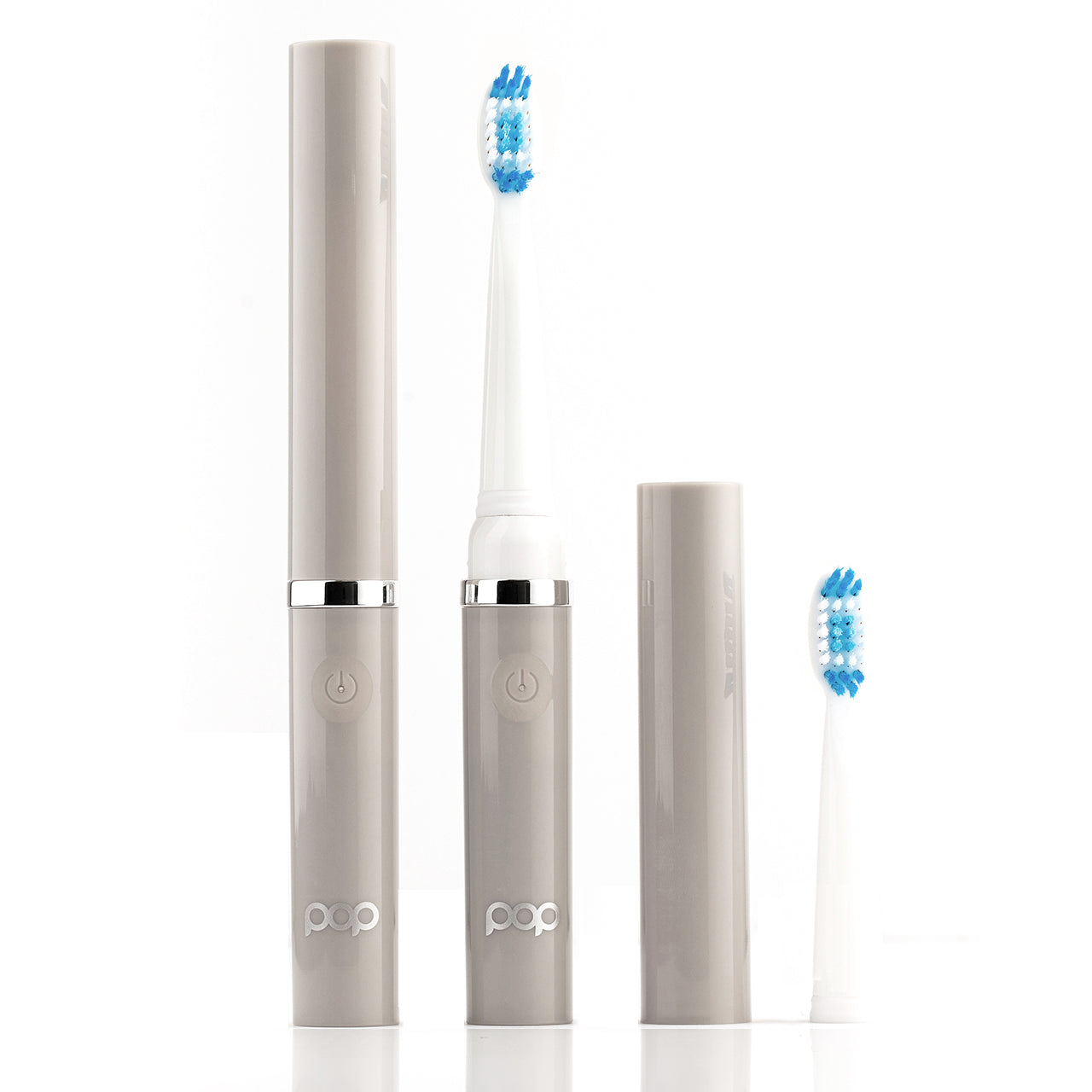 Set of Pop electric toothbrushes with travel cases on a white background