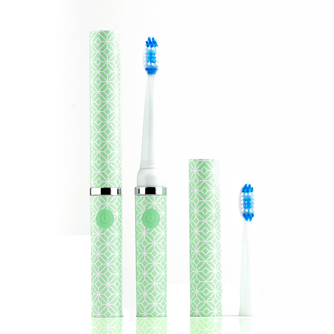 Electric toothbrush set with green patterned cases on a white background