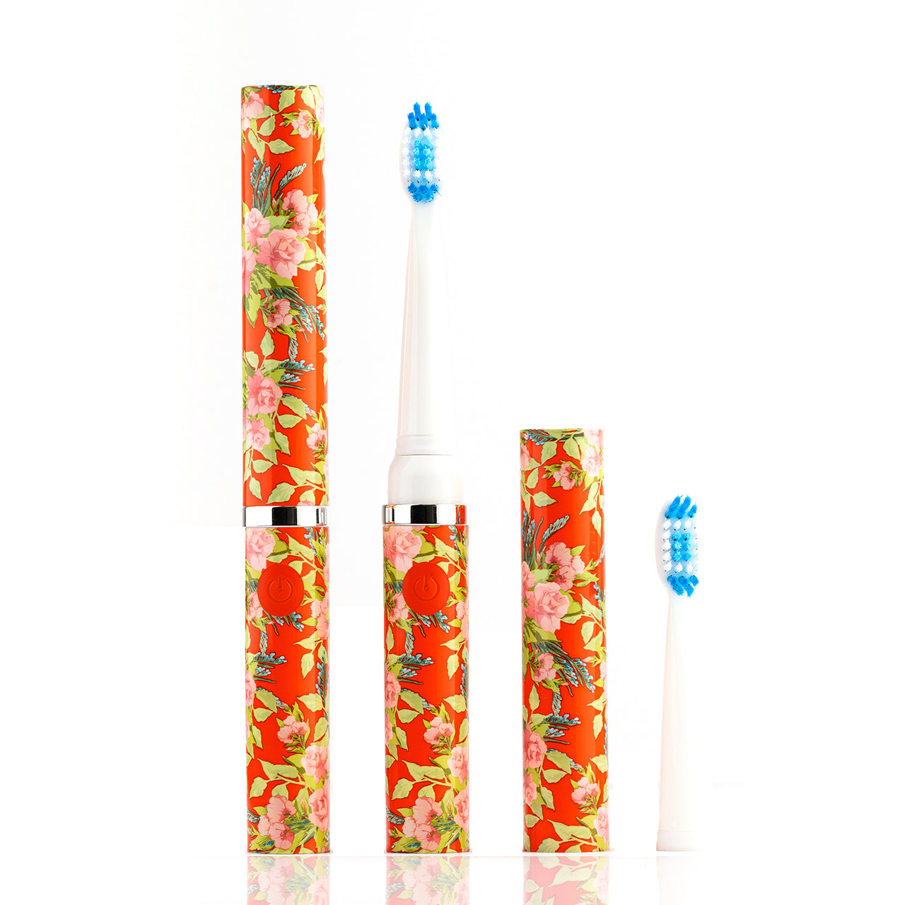 Floral-patterned electric toothbrush set on a white background