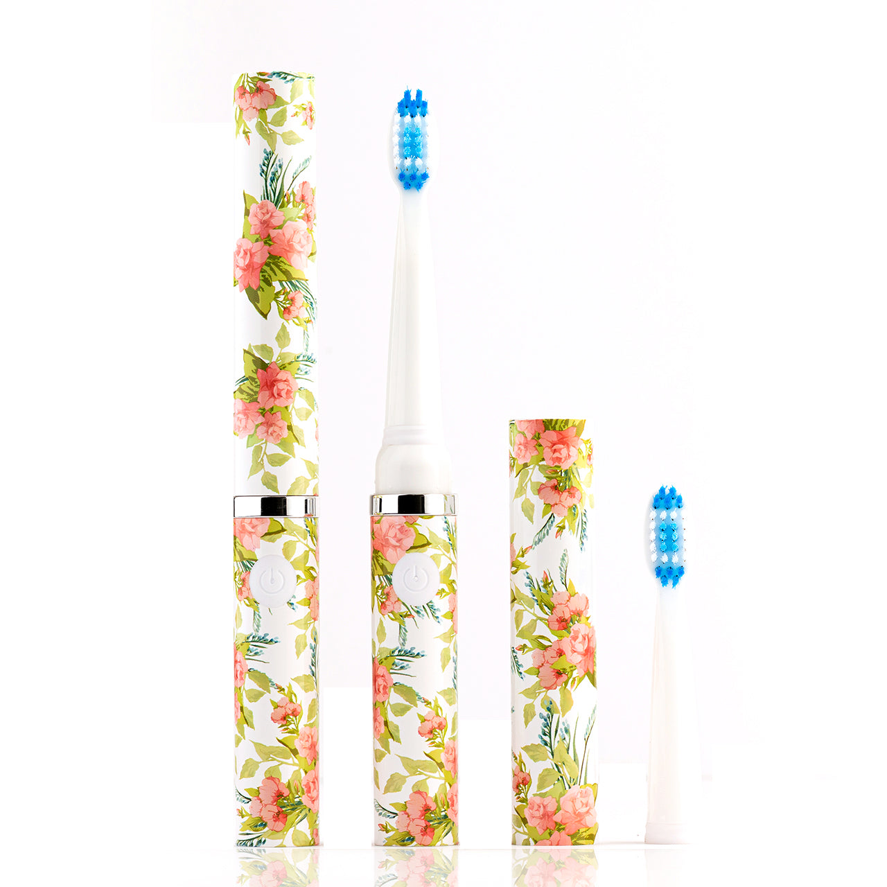 Floral-patterned electric toothbrush on a white background