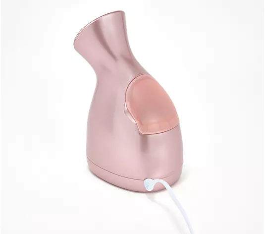 Image showing the back of the Rose Gold Nano Facial Steamer to see the water compartment and plug-in cord, with a white background