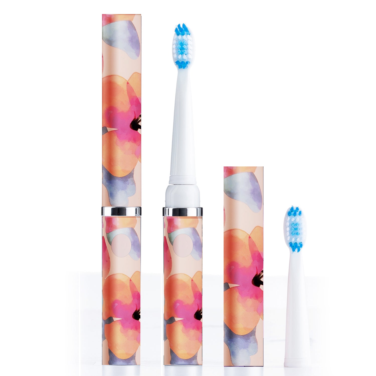 Electric toothbrush with floral design on handle and packaging against a white background