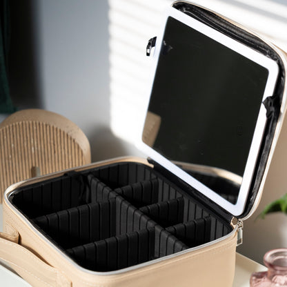 LED Makeup and Nailcare Cosmetic Case in the color Champagne, unzipped and open to see the inside compartments