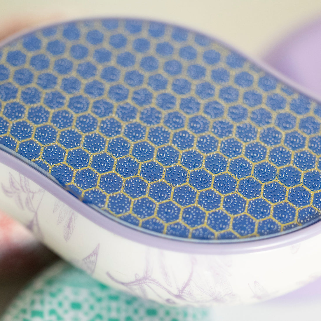 A close-up image of the Mango Foot File showing the glass surface