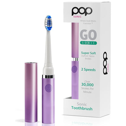 Purple ombre sonic toothbrush with packaging on a white background