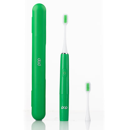 Green electric toothbrush with charging case on a white background