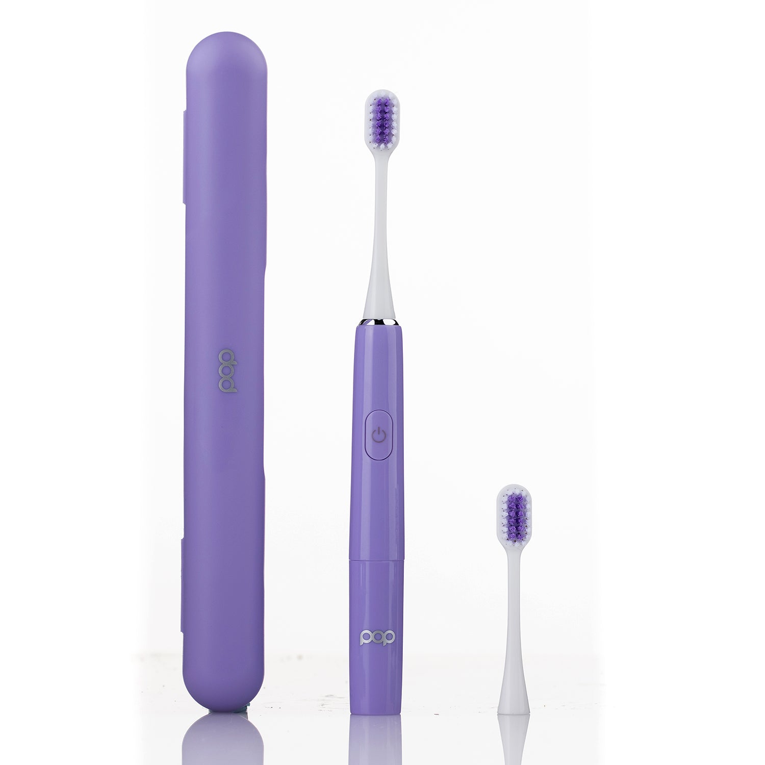 Purple electric toothbrush with travel case on a white background