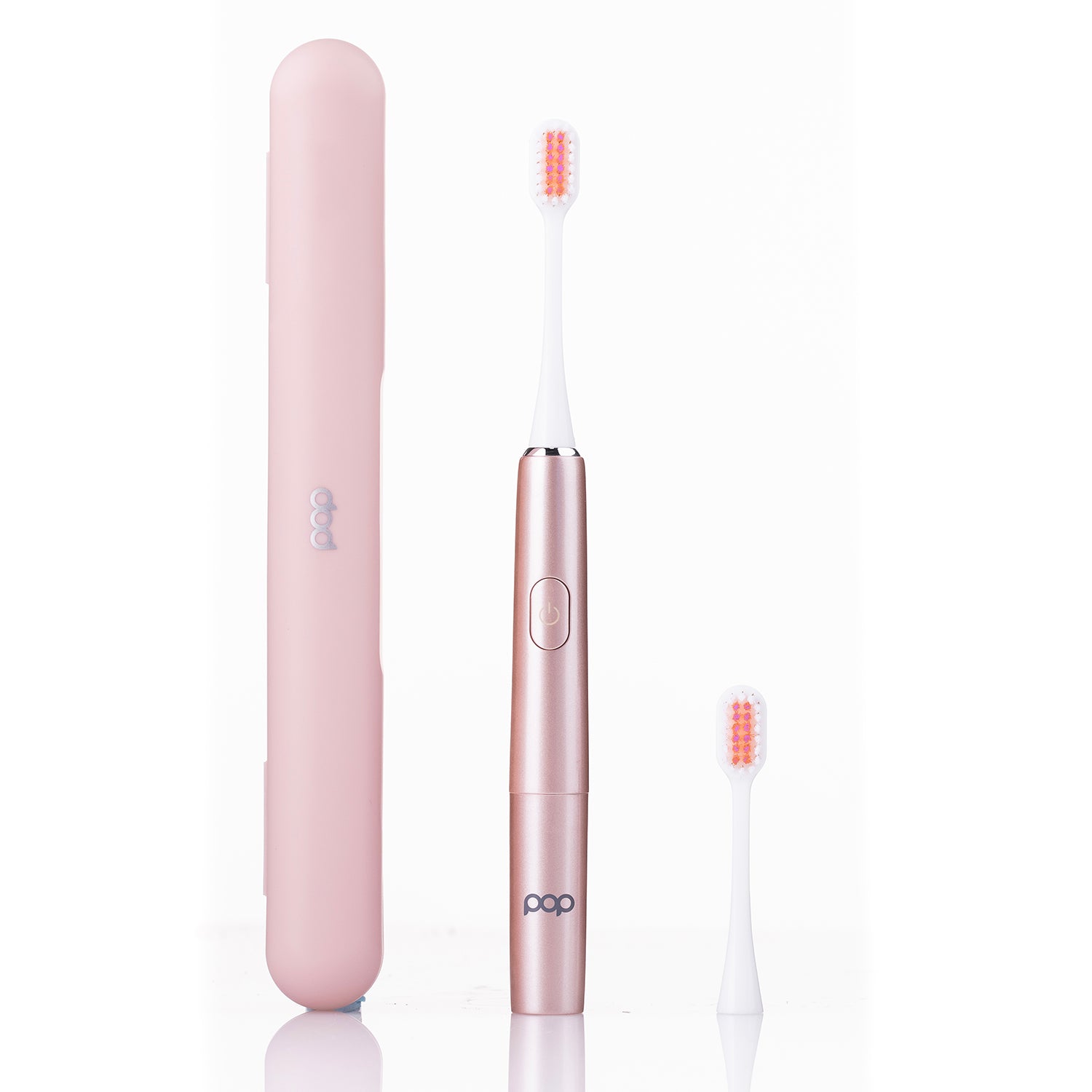 Rose Gold electric toothbrush with travel case on a white background