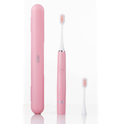 Pink electric toothbrush with travel case on a white background
