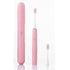 Pink electric toothbrush with travel case on a white background