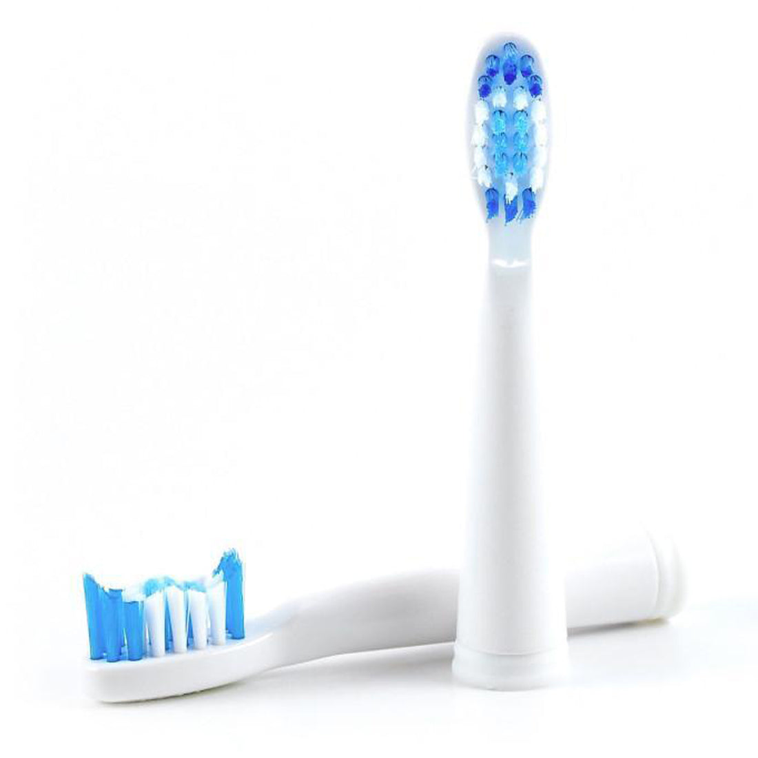 White electric toothbrush heads with blue bristles on a white background