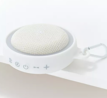 White electronic device with textured surface on a light beige background