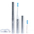 Silver electric toothbrush with charging cable on a white background
