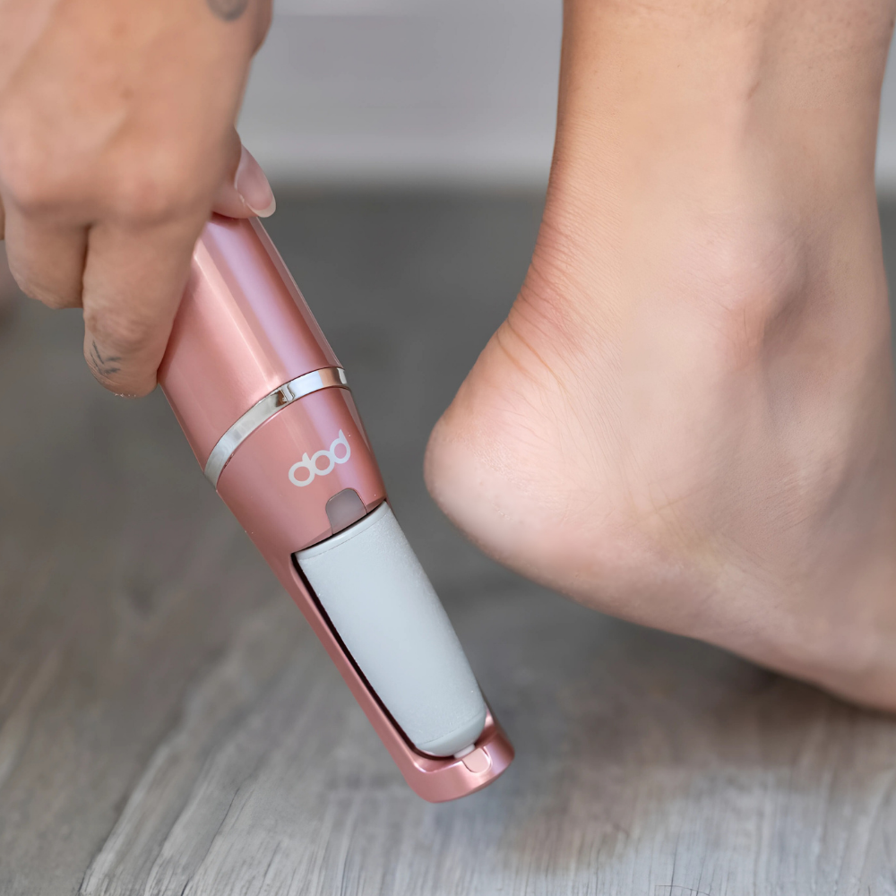 Sole Smoother in Rose Pink being held next to a woman&